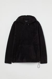 Oferta de Hoodie en peluche con capucha Relaxed Fit por $73430 en H&M